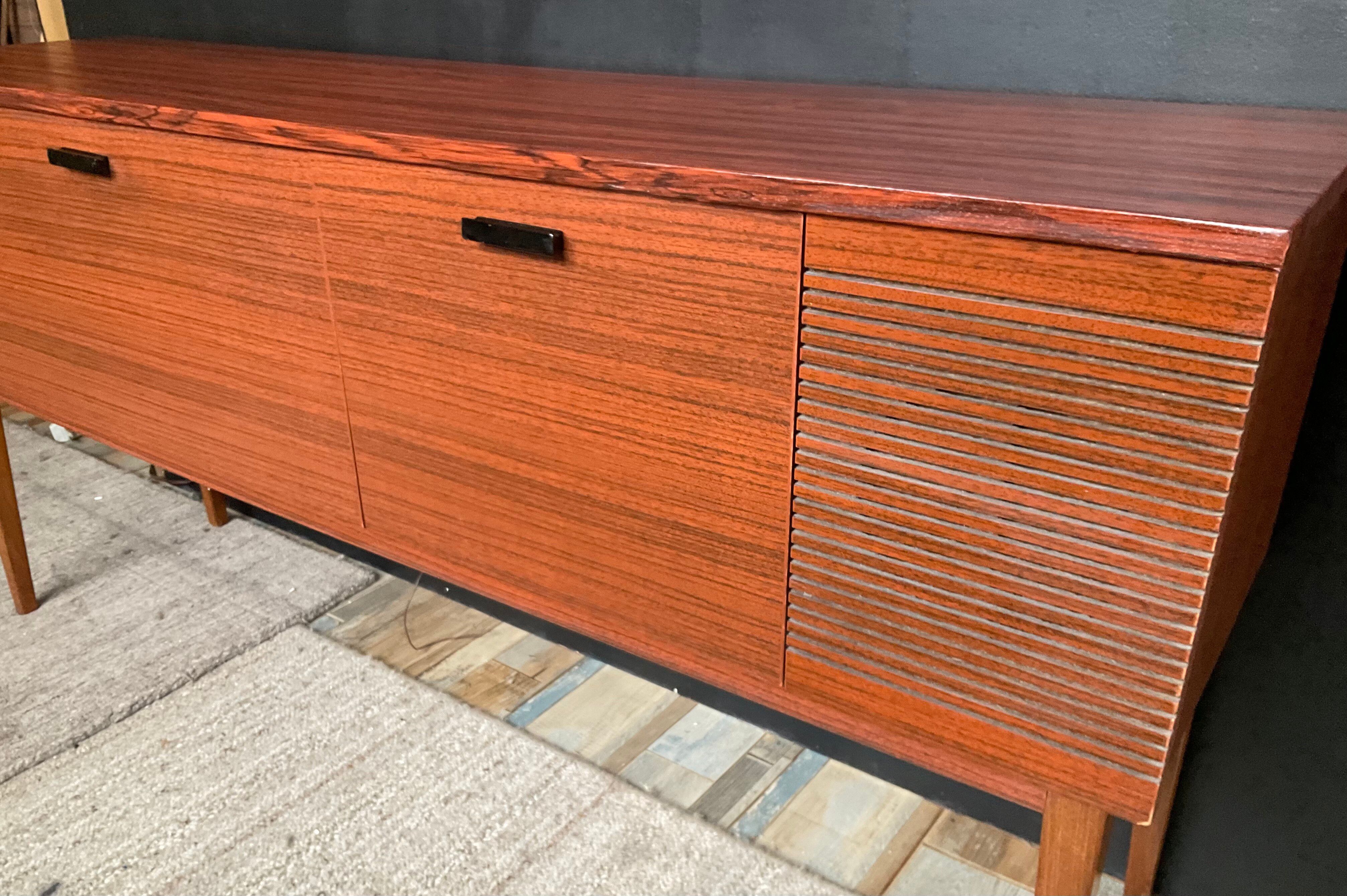 Vintage TV sideboard with radio and turntable.