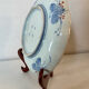 Imari porcelain plate from Japan, 19th century, hand-painted decoration.
