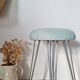 Vintage 1950s stool, metal tapered legs and velvet.