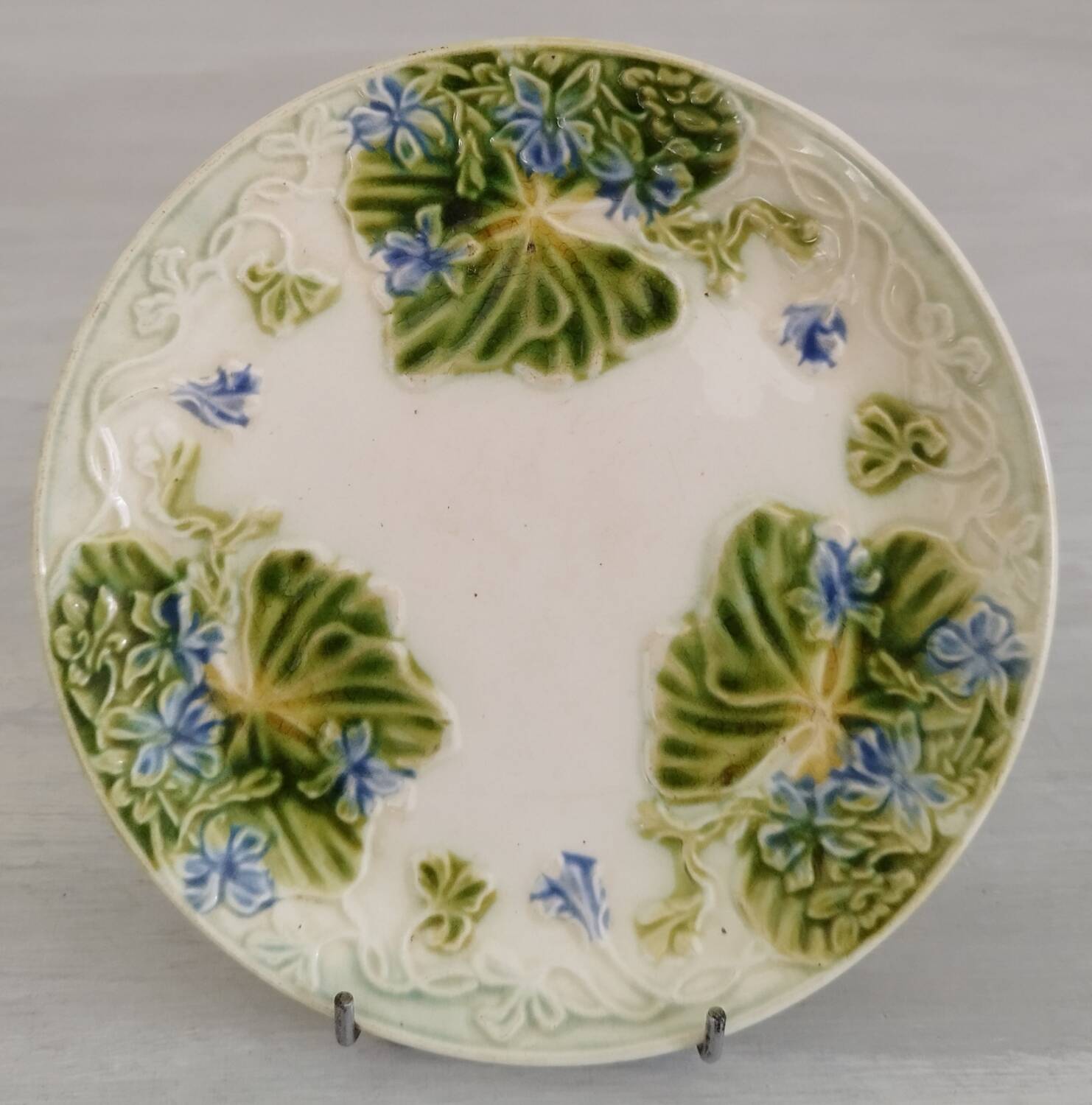 Antique Barbotine Plate Floral Decor and Green Foliage
