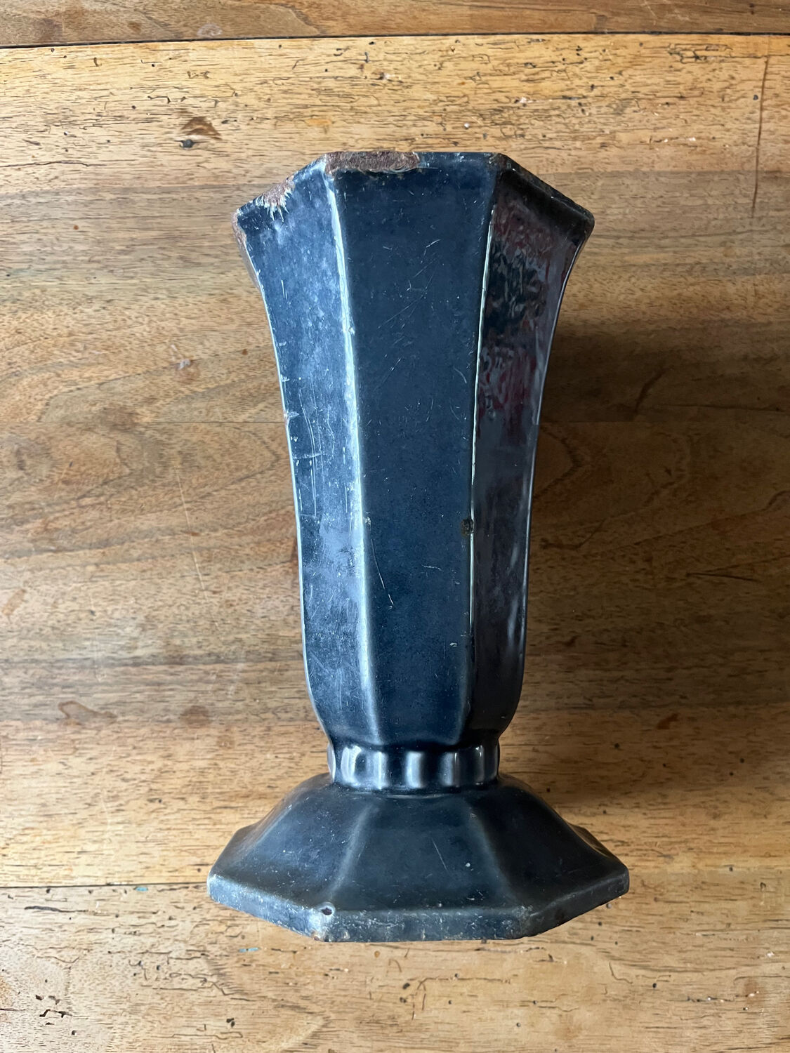 Antique enamelled cast iron vase