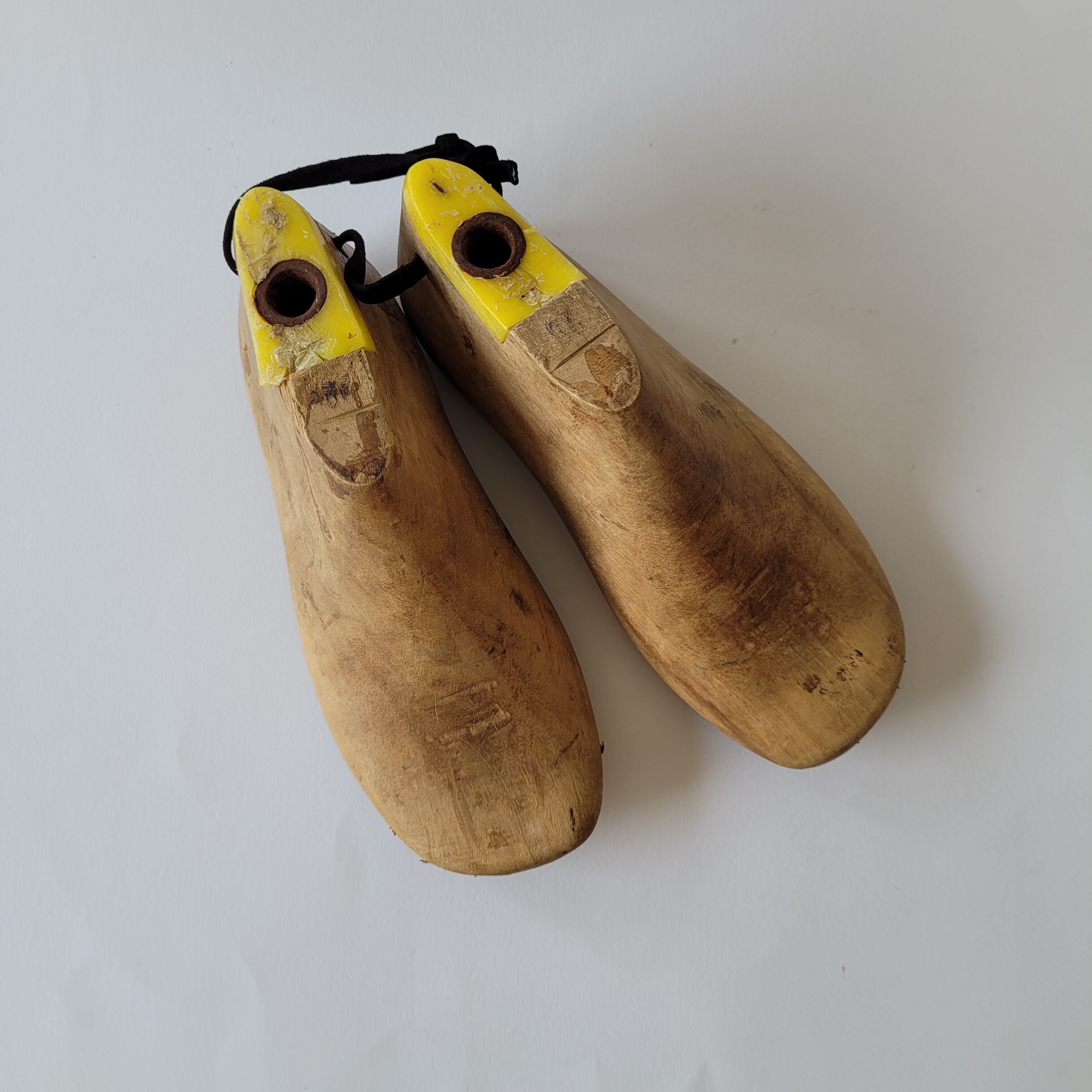 Pair of old wooden shoe shapes