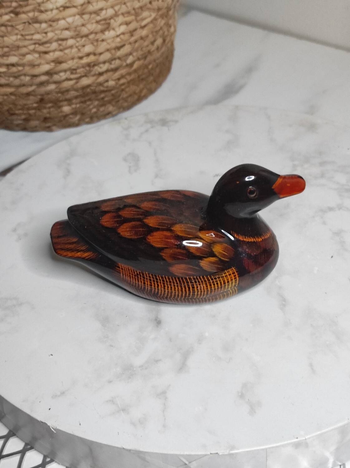 Antique duck figurine