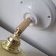Wall lamp in opaline, brass and porcelain