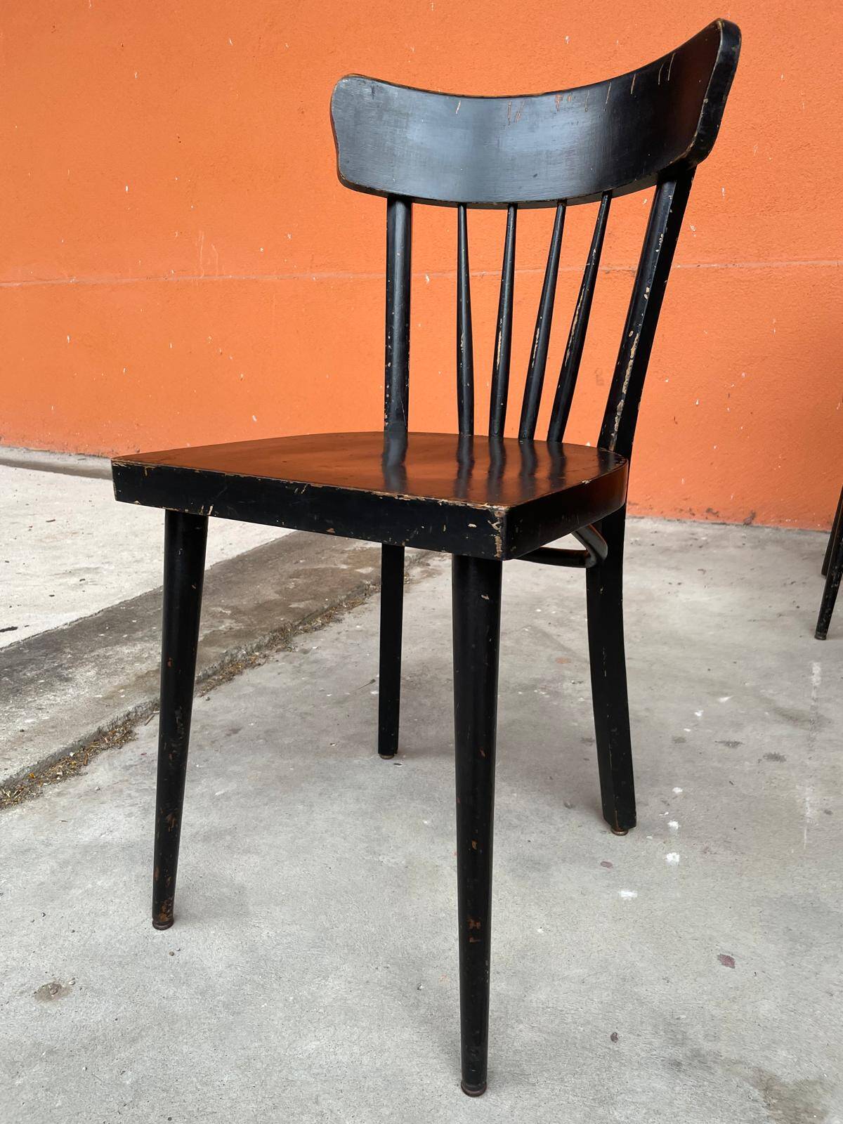 Set of 18 curved wooden bistro chairs with patina from the 60s