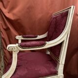 Louis XVI style armchair in patinated wood and damask fabric