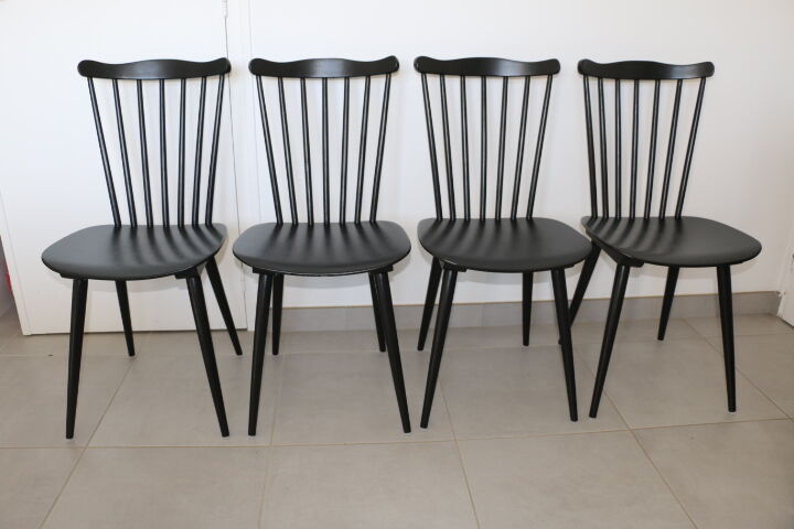 4 black Baumann V5 chairs