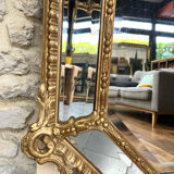 Mirror with parecloses with pediment, gilded with gold leaf