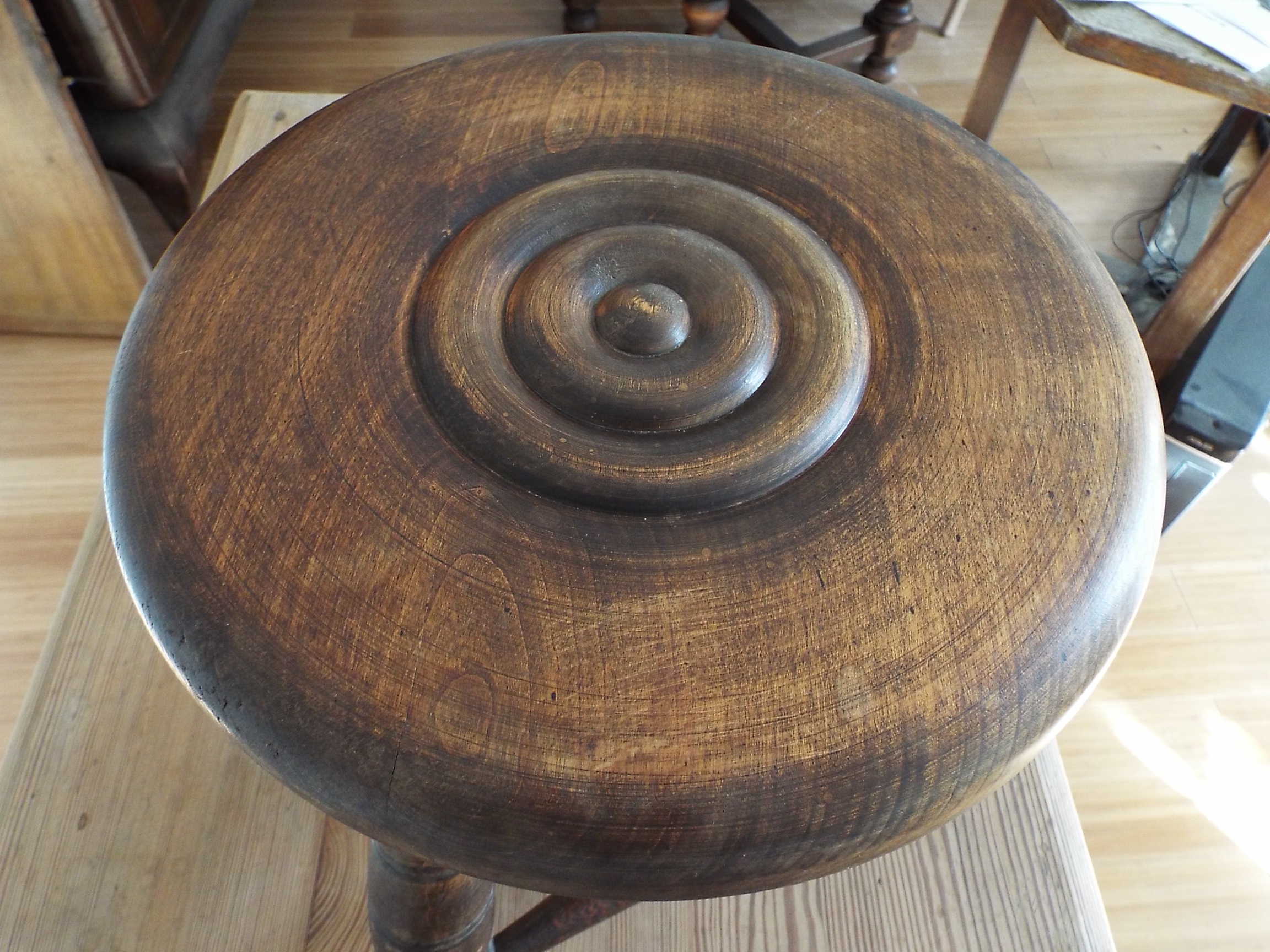 Turned wooden tripod stool