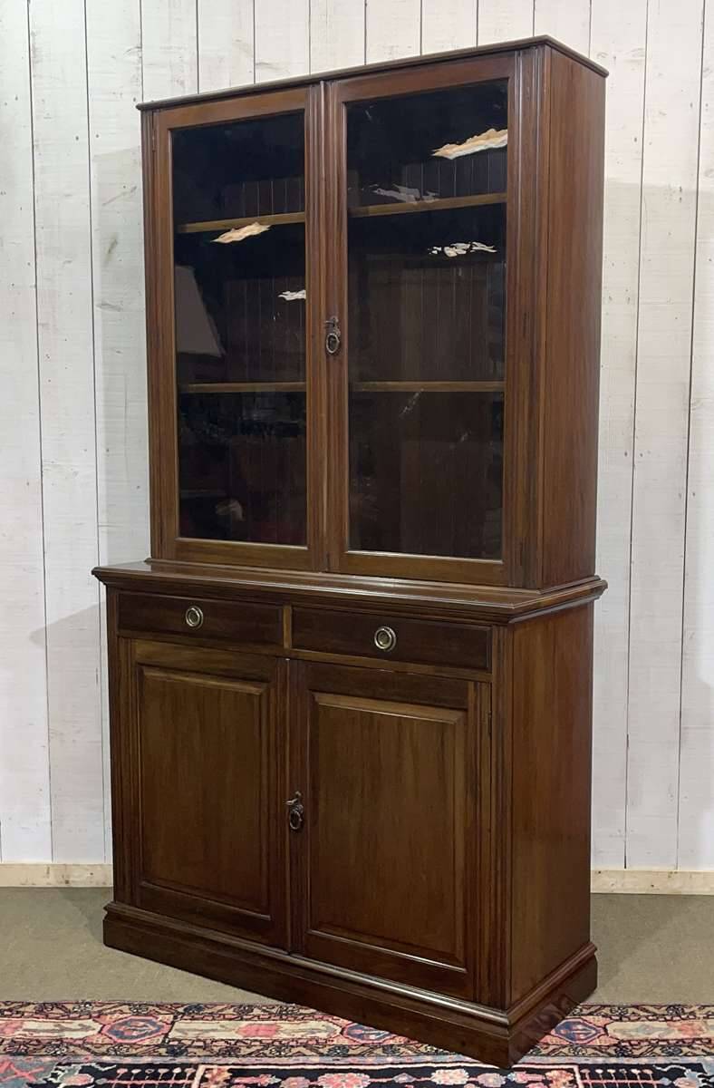 English walnut two-body library from the early 20th century.