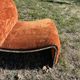 Chrome steel armchair and orange fabric by Vittorio Introini