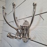 Circular chromed metal coat rack