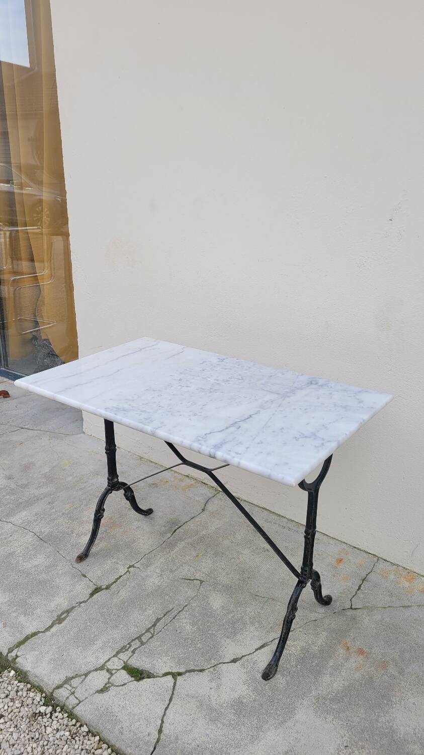 Marble and antique cast iron bistro table
