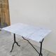 Marble and antique cast iron bistro table