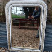 Miroir ancien avec cadre en bois sculpté 