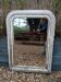 Antique mirror with carved wooden frame