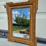 Wood and gilded Stuk mirror 19th