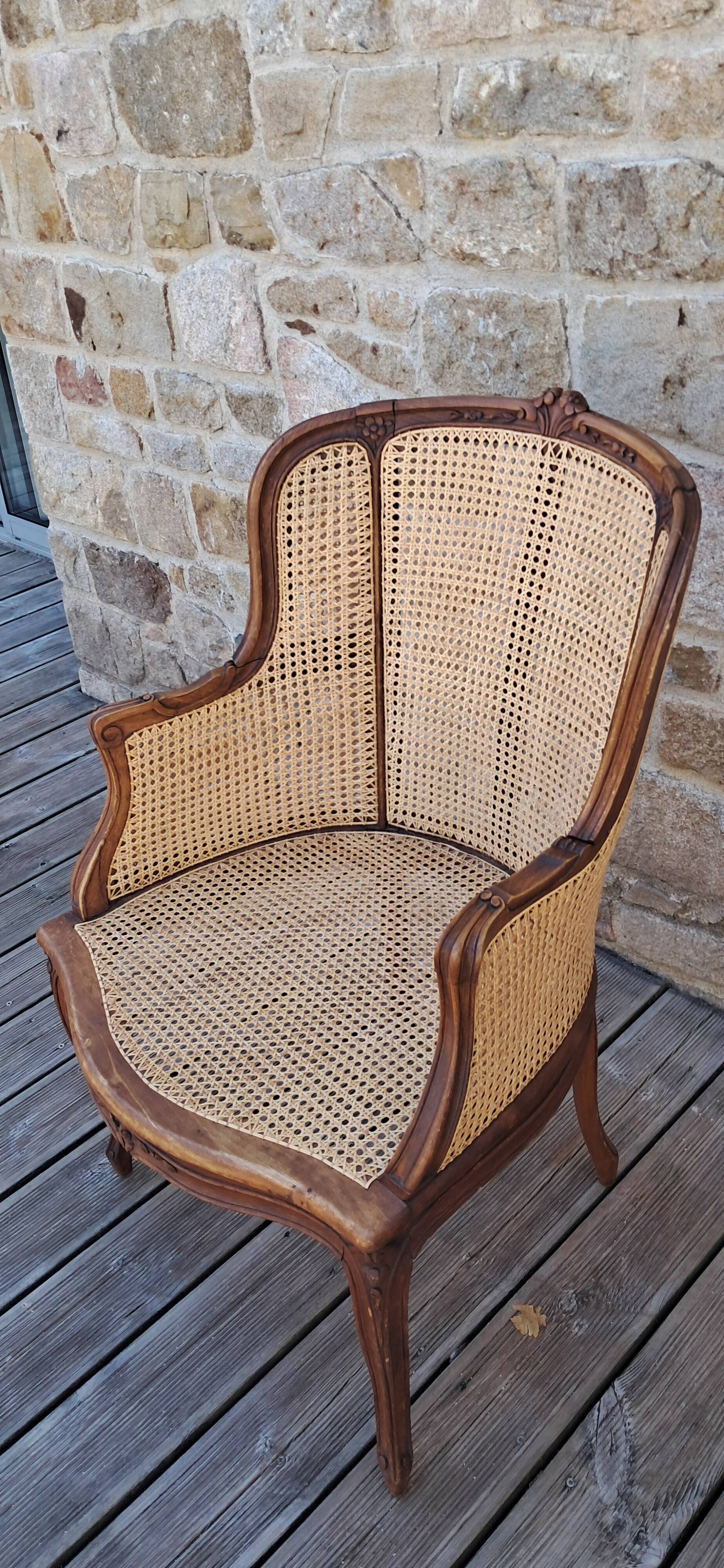 Caned armchair.