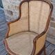 Caned armchair.