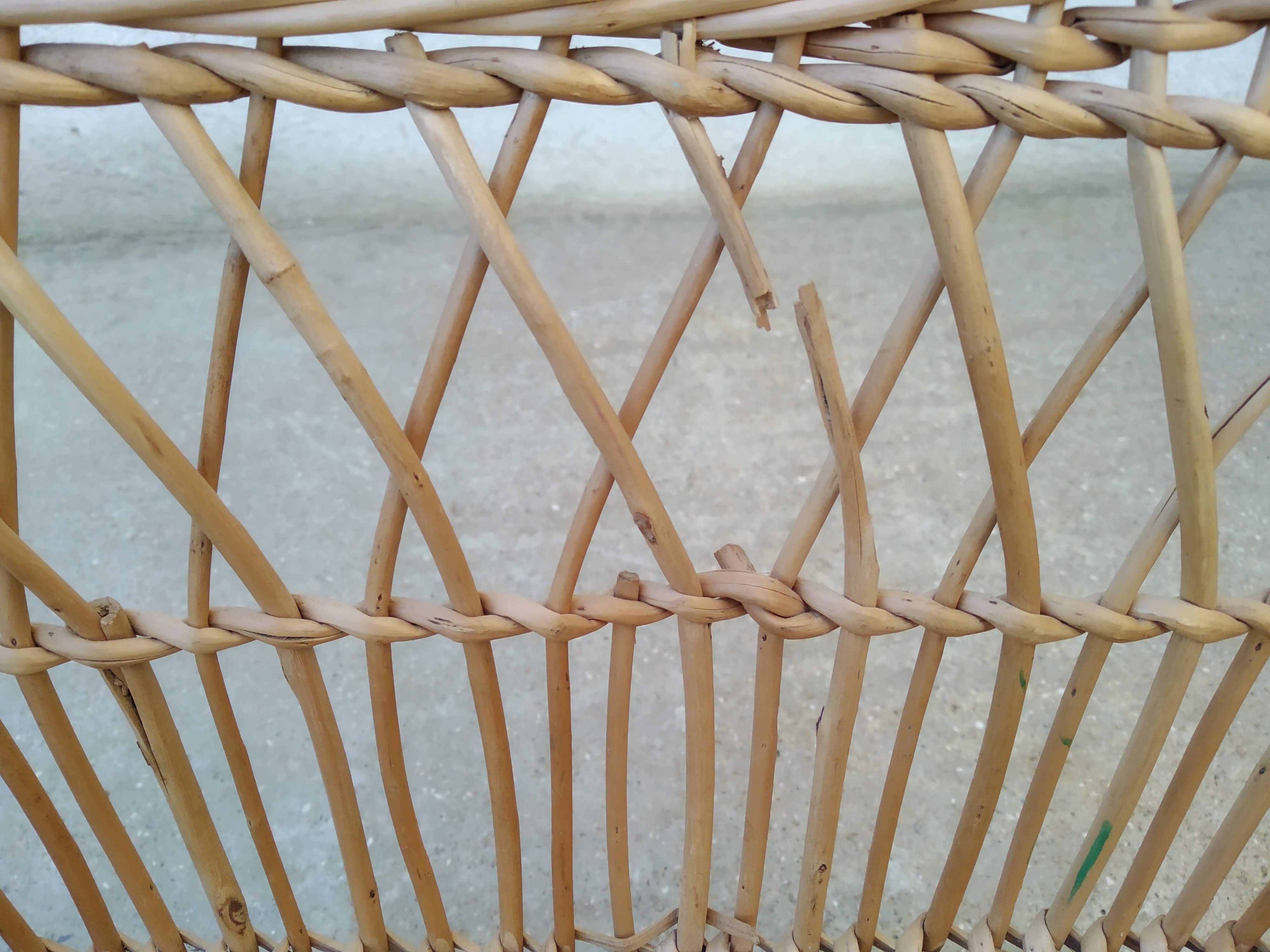Rattan cradle for doll on vintage wheels