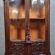 Curved library with two walnut doors, in Louis XV style.