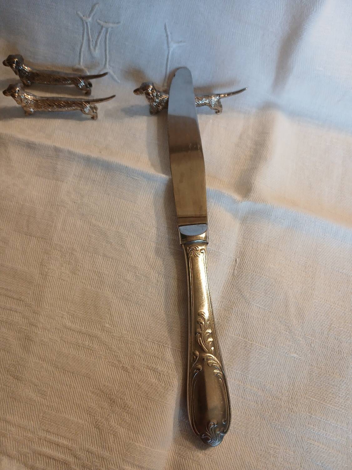 6 porte couteaux en métal argenté 