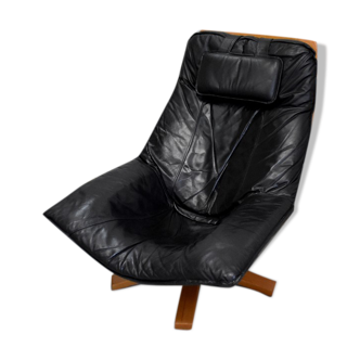 Leather and beech relaxation chair - 1970 / 1980