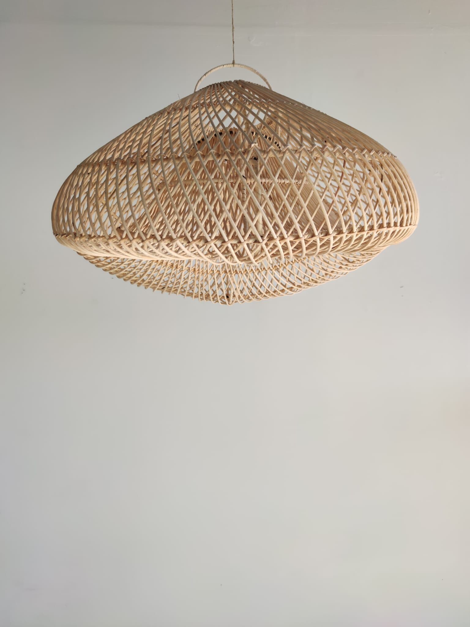Small rattan lampshade in the shape of a braided hat