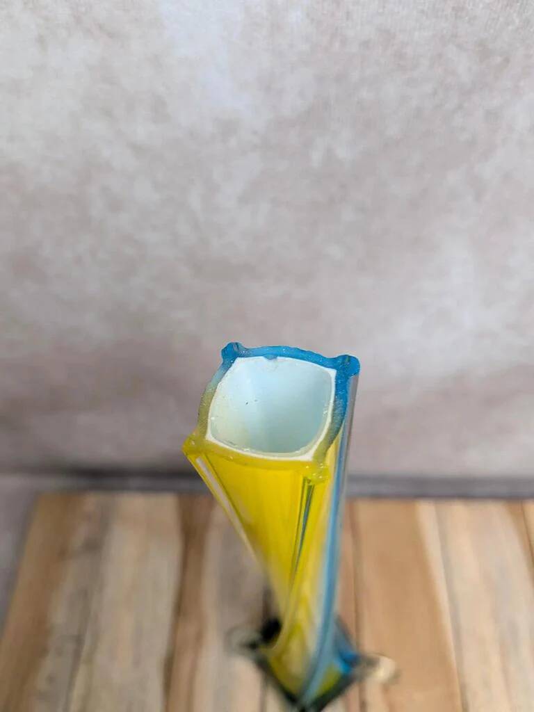 Vintage glass vase in blue and yellow Murano style.
