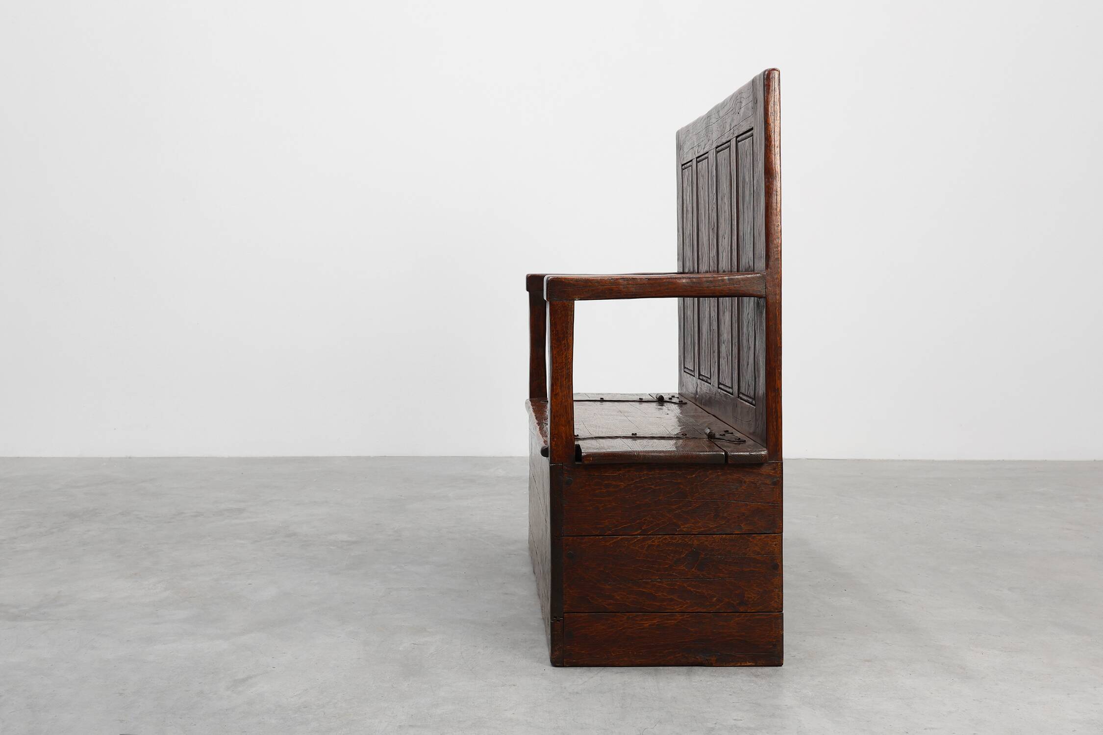 Rustic solid oak carved bench with storage compartment, France 19th century