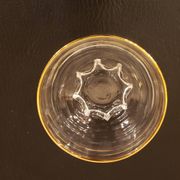 Set of 17 elegant bowls with gold rims