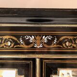 Napoleon III bookcase, blackened wood inlaid with brass, ivory and mother-of-pearl