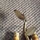 Wall lamp in gold metal