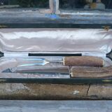 Horn and stainless steel lamb service meat knife
