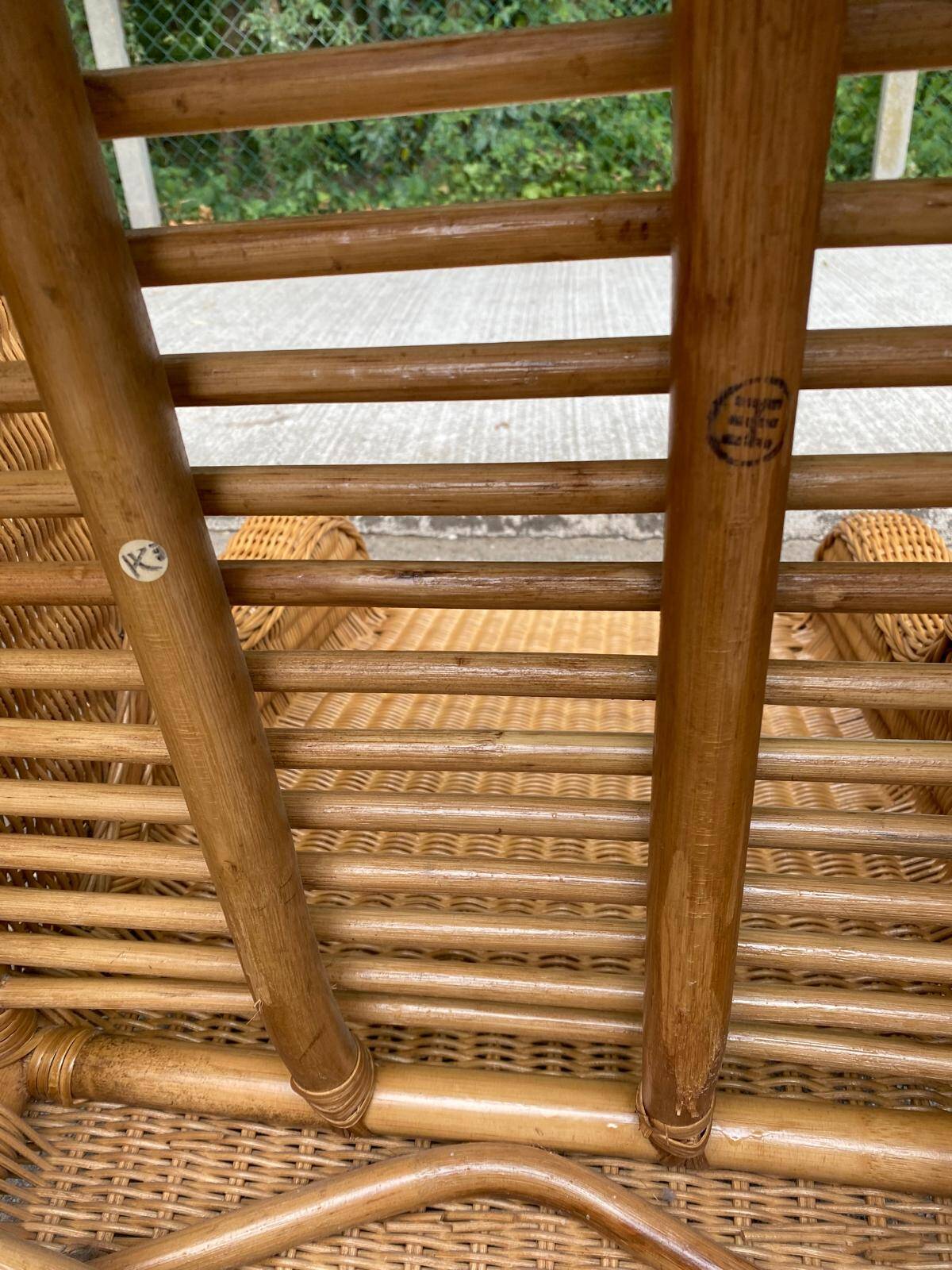 2 rattan and woven wicker armchairs in vintage 70s style