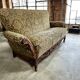 Vintage baroque chair with a rich floral pattern