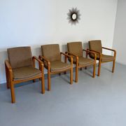 4 armchairs with armrests in beech and fabric, 1970s vintage design.