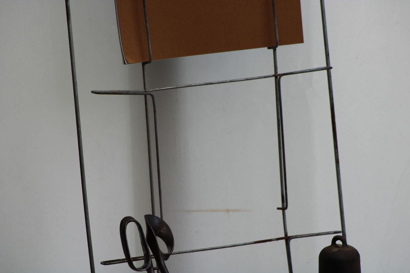 Former metal newspaper display