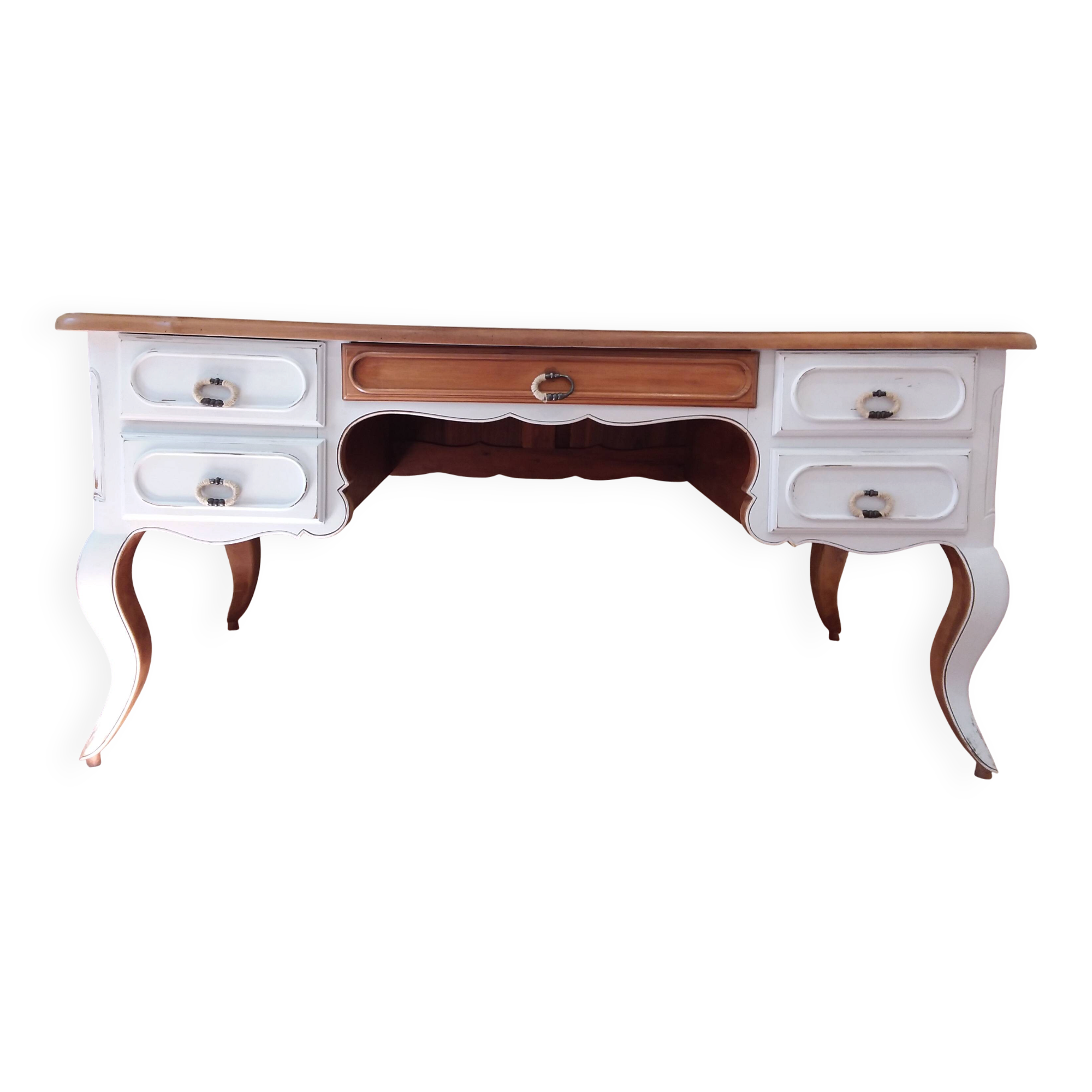 Solid wood desk with distressed white paint.
