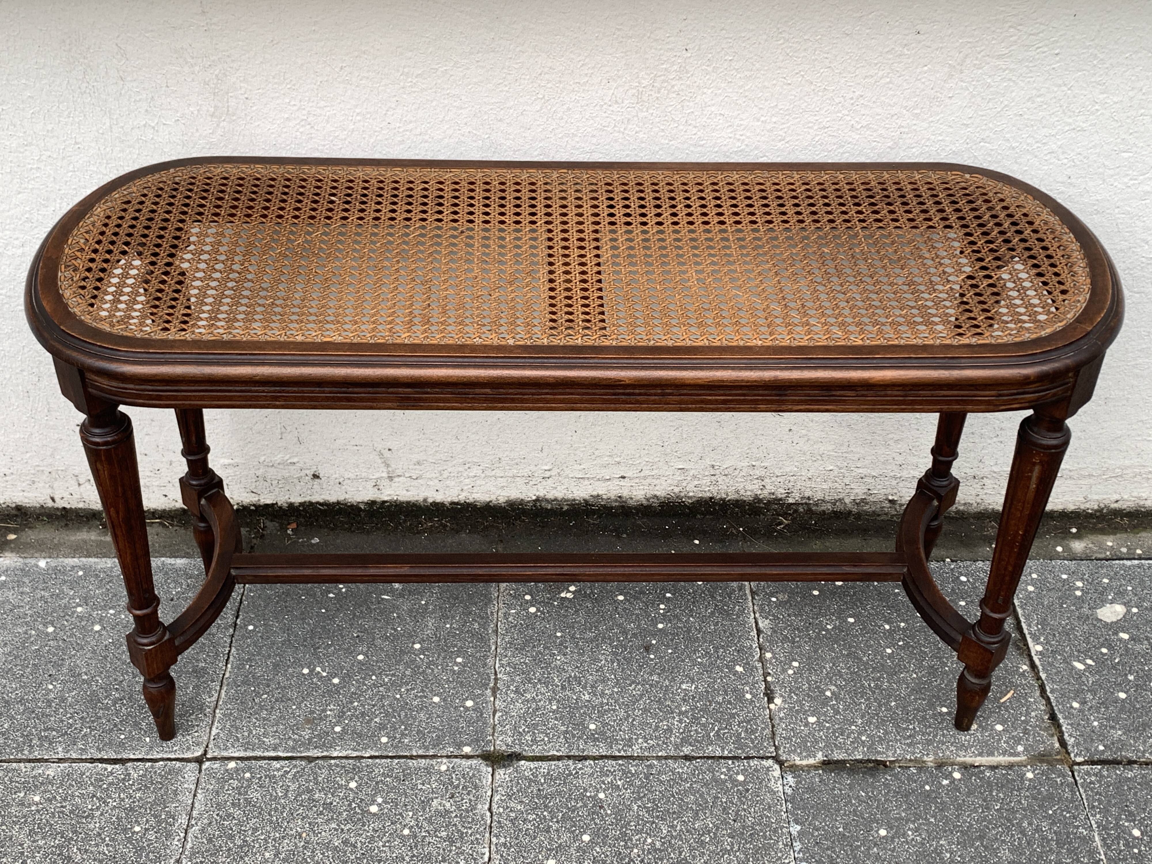 Old wooden bench and cannage, Louis XVI style