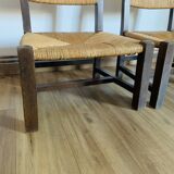 Pair of low wooden and straw armchairs