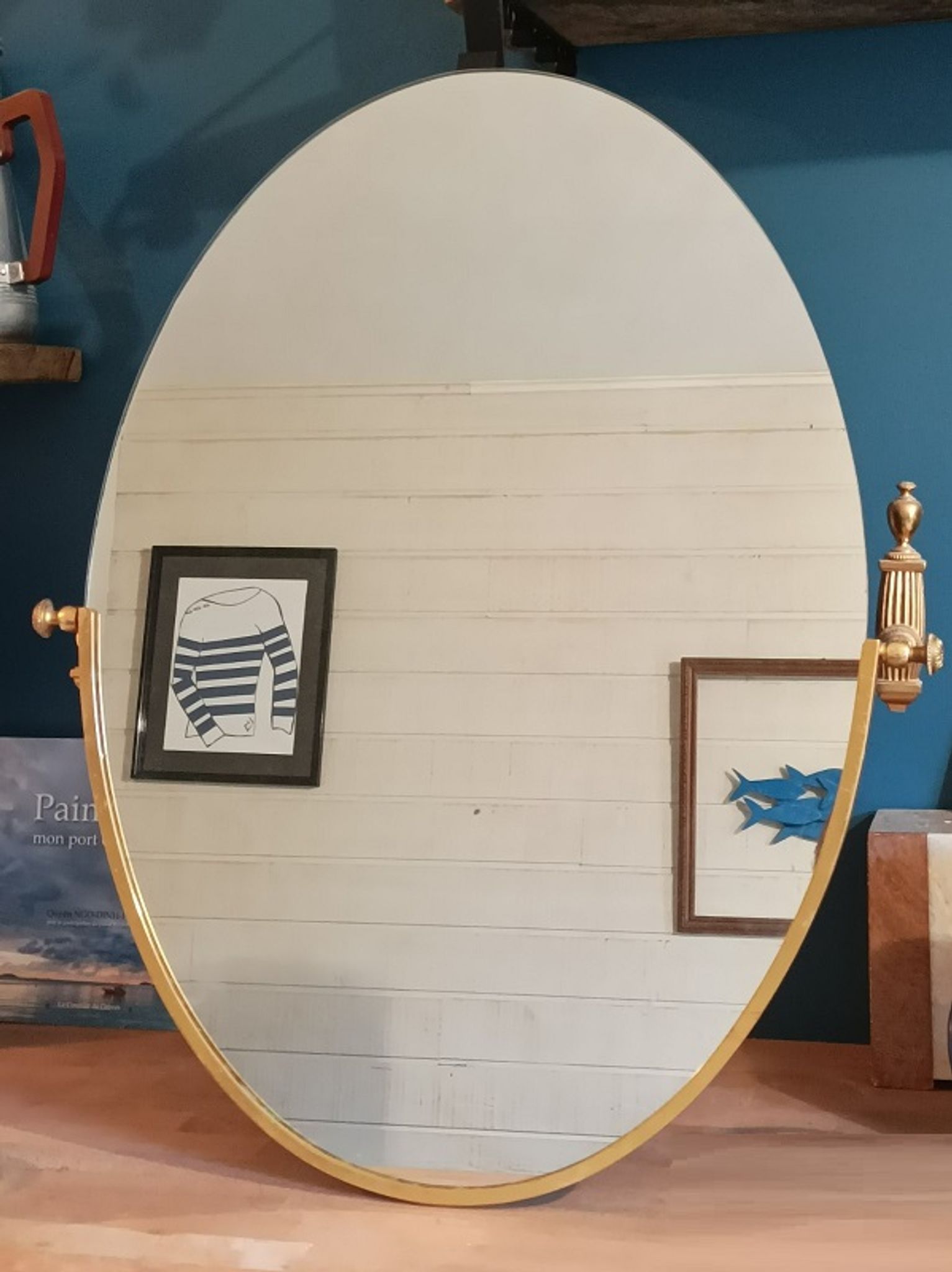 Oval mirror patinated brass frame art deco