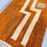 Modern Moroccan rug in rust wool with cream lines 150/250 cm