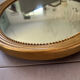 Vintage oval gold mirror