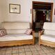 2-SEATER CHALET-STYLE SOFA AND ARMCHAIR, Jacques LELEU Collection