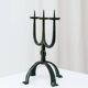 Black hand-forged iron candleholder statue with mid-century, 70s Brutalist tripod design
