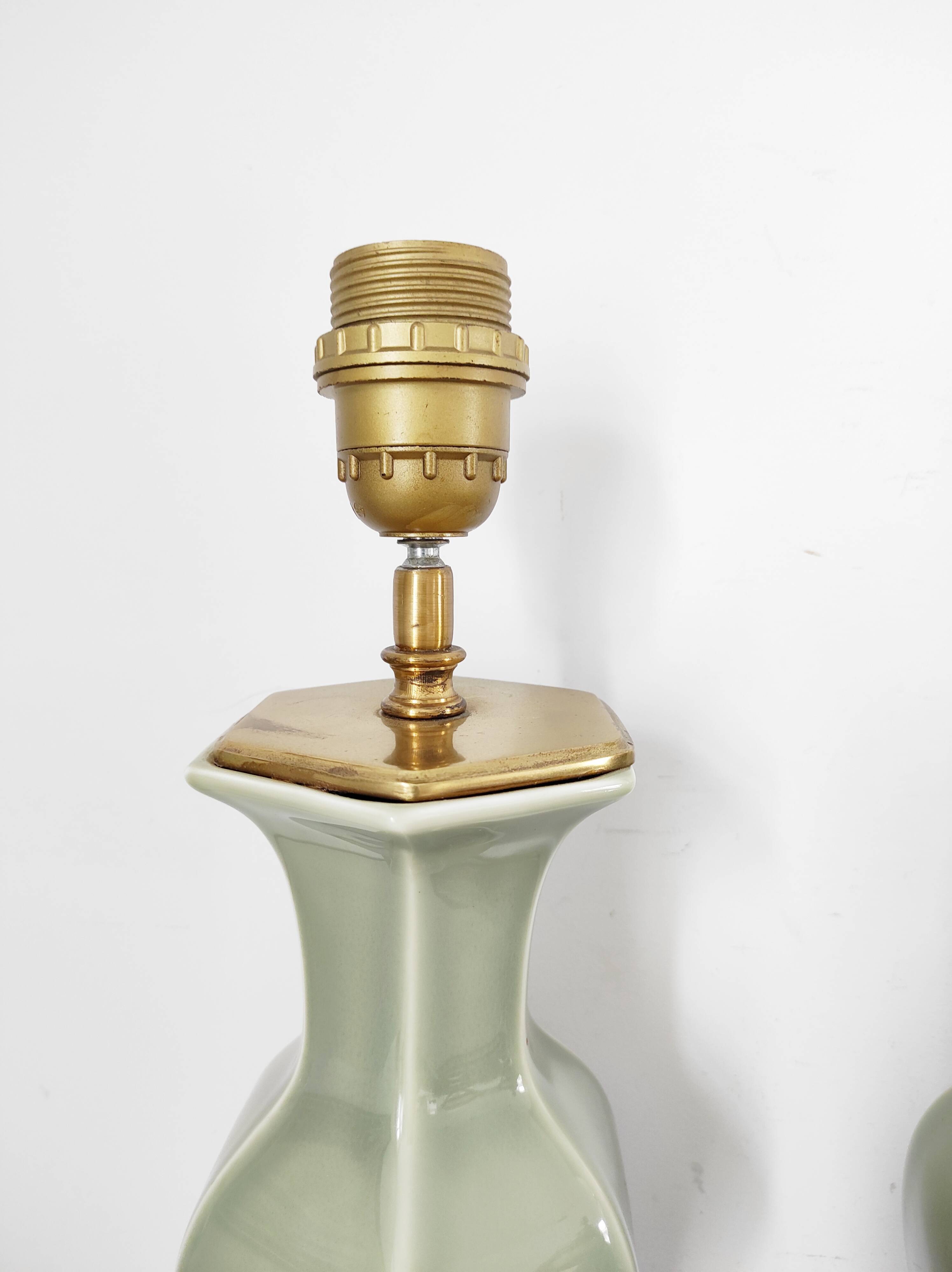 Two celadon-colored ceramic lamp bases