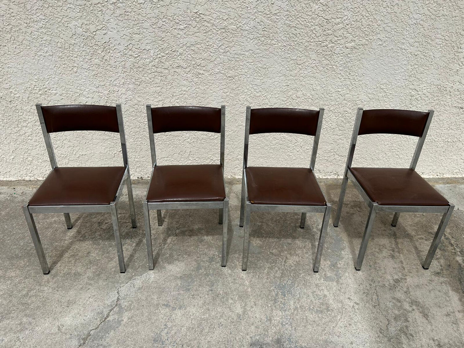 4 vintage leather/iron chairs