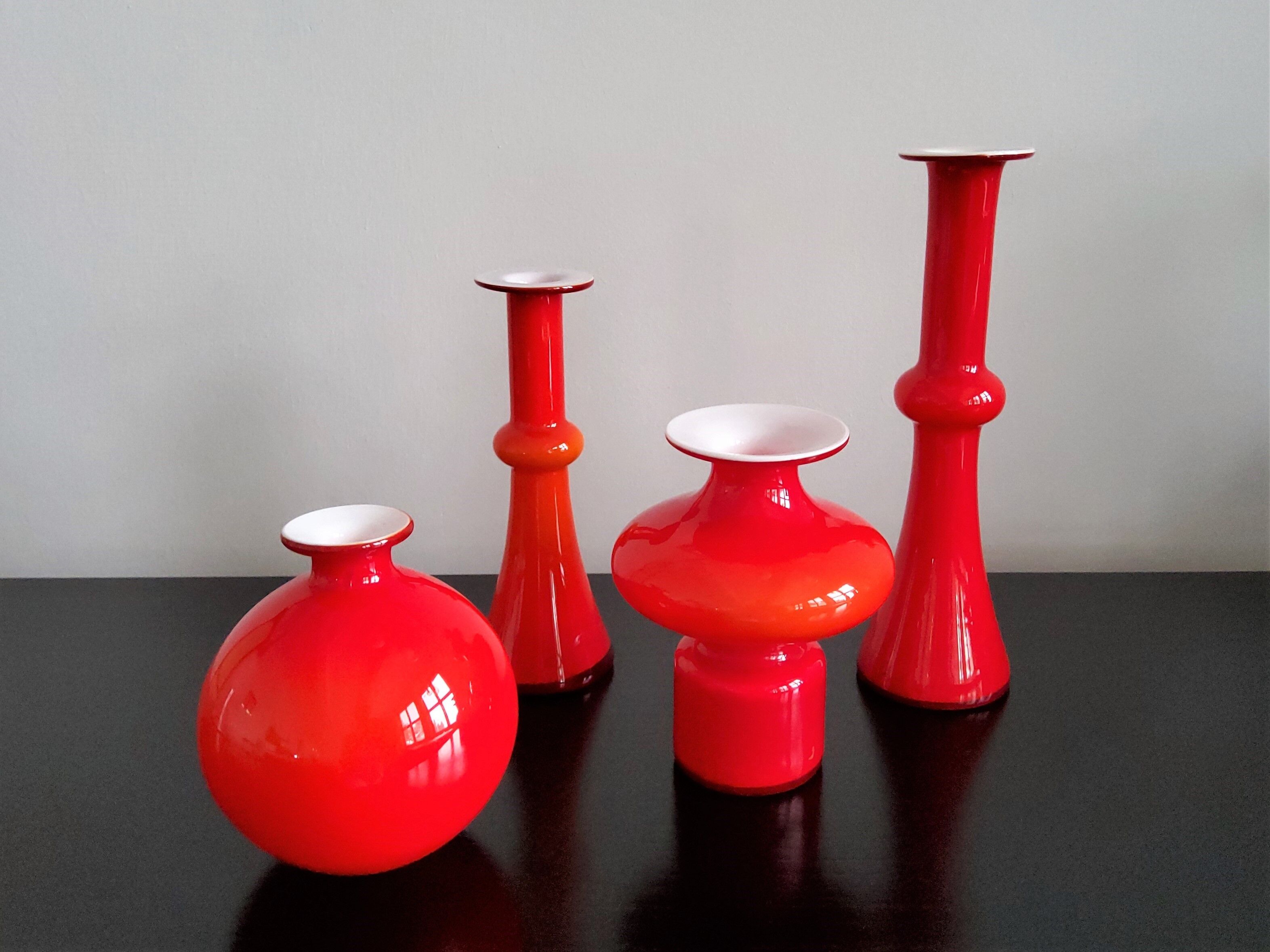 Arrangement of 4 red glass 'Carnaby' vases by Per Lütken for Holmegaard, Denmark 1960's