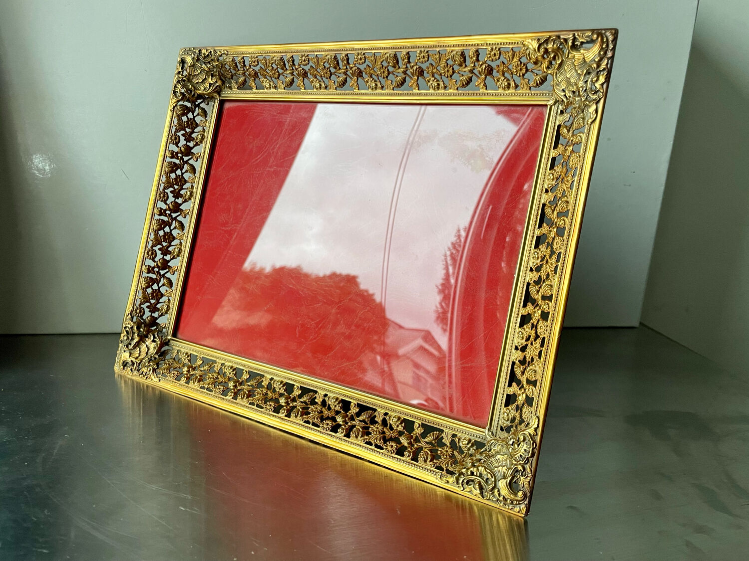 Antique xl metal frame in gold colored brass 29.5 cm x 23 cm convex glass